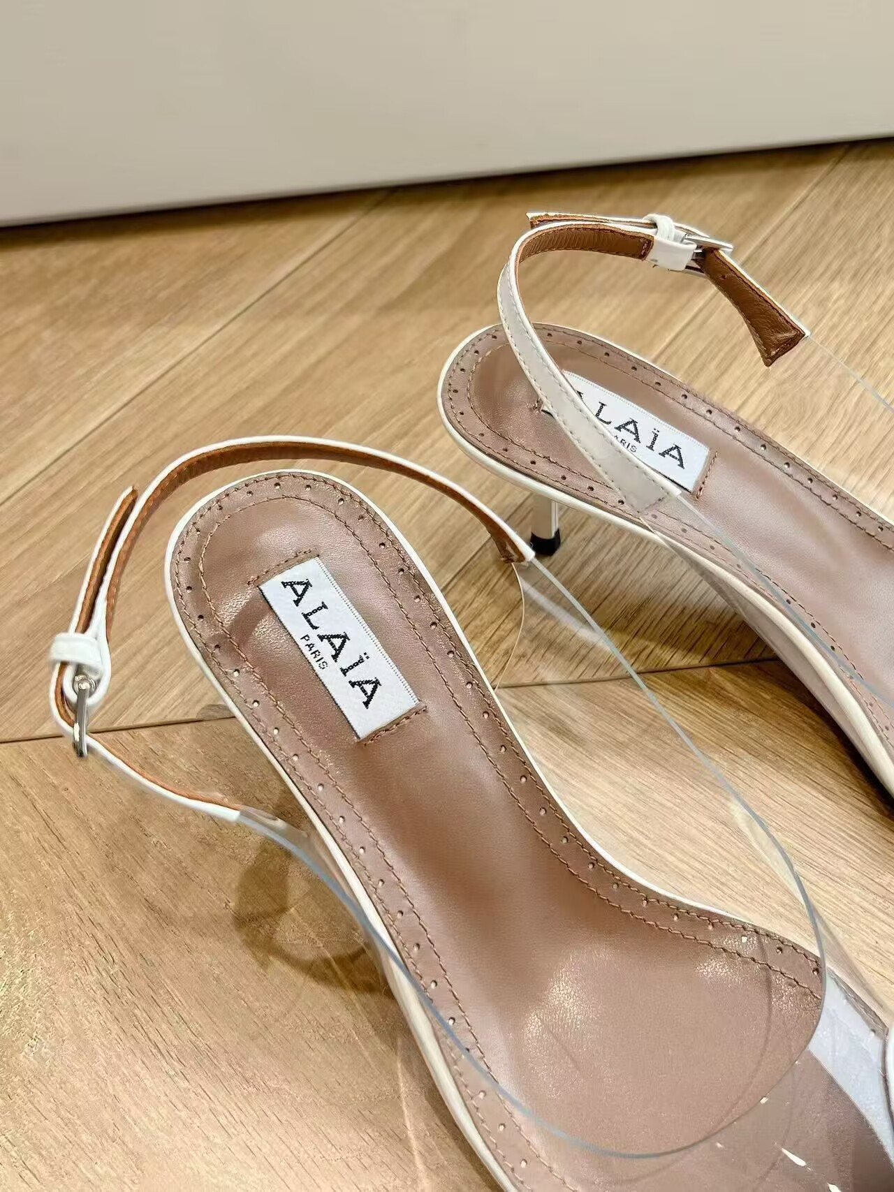 UA ALAÏA Le Coeur Plexi Heart-Toe Slingback Pump