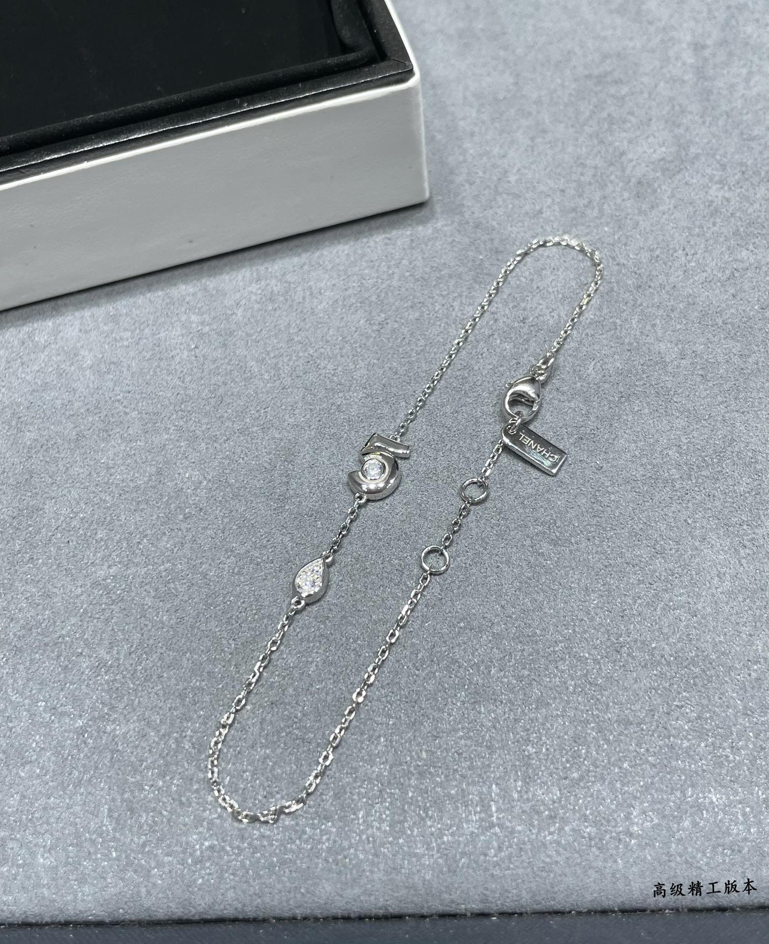 Ch*el 5-word bracelet