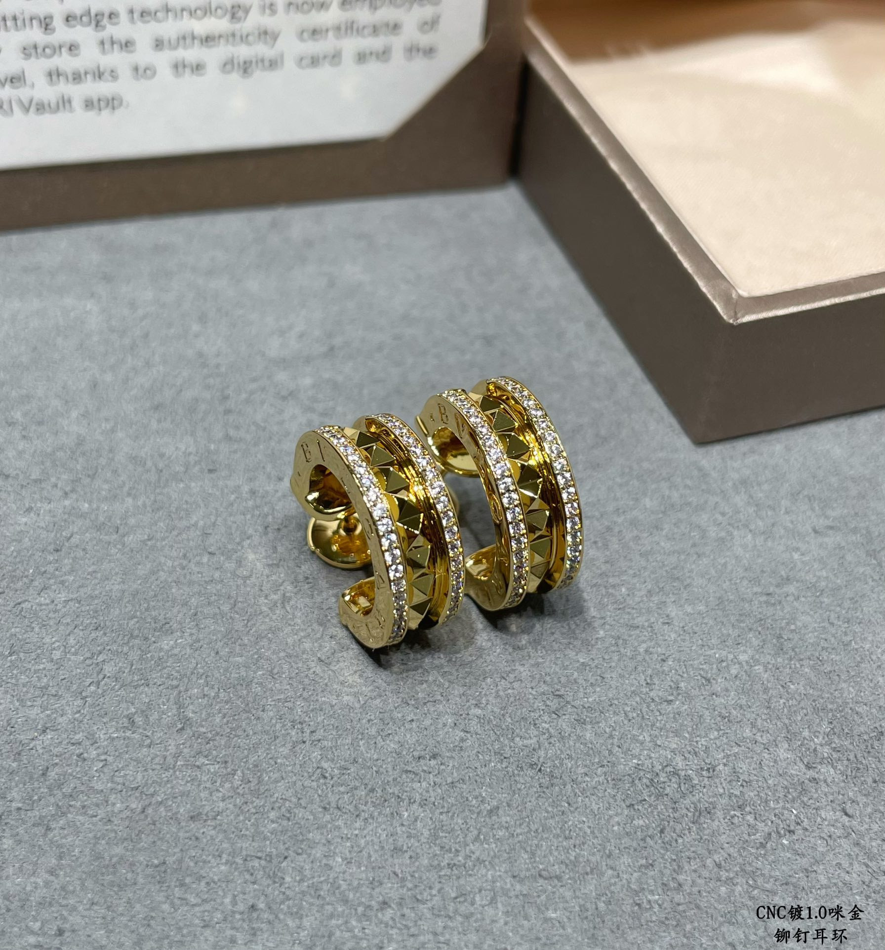 B*l*ai drill rivets on both sides earrings