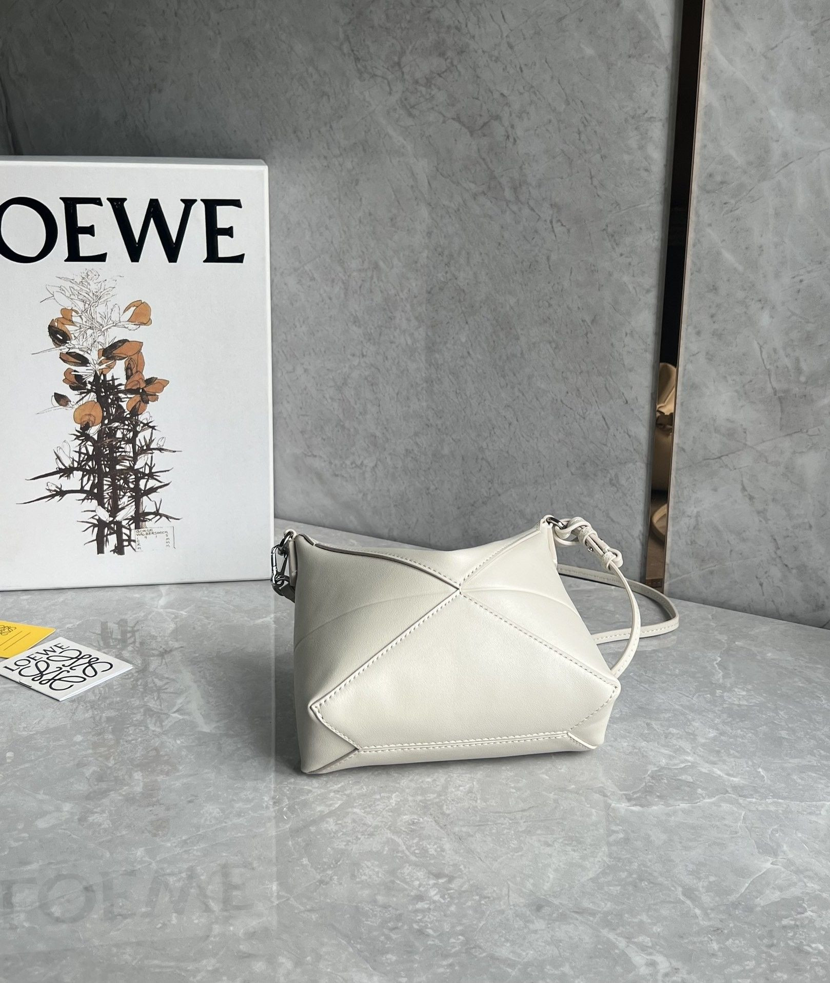 L0ew* puzzle fold pouch in shiny nappa calfskin 15.5x23x6.5cm