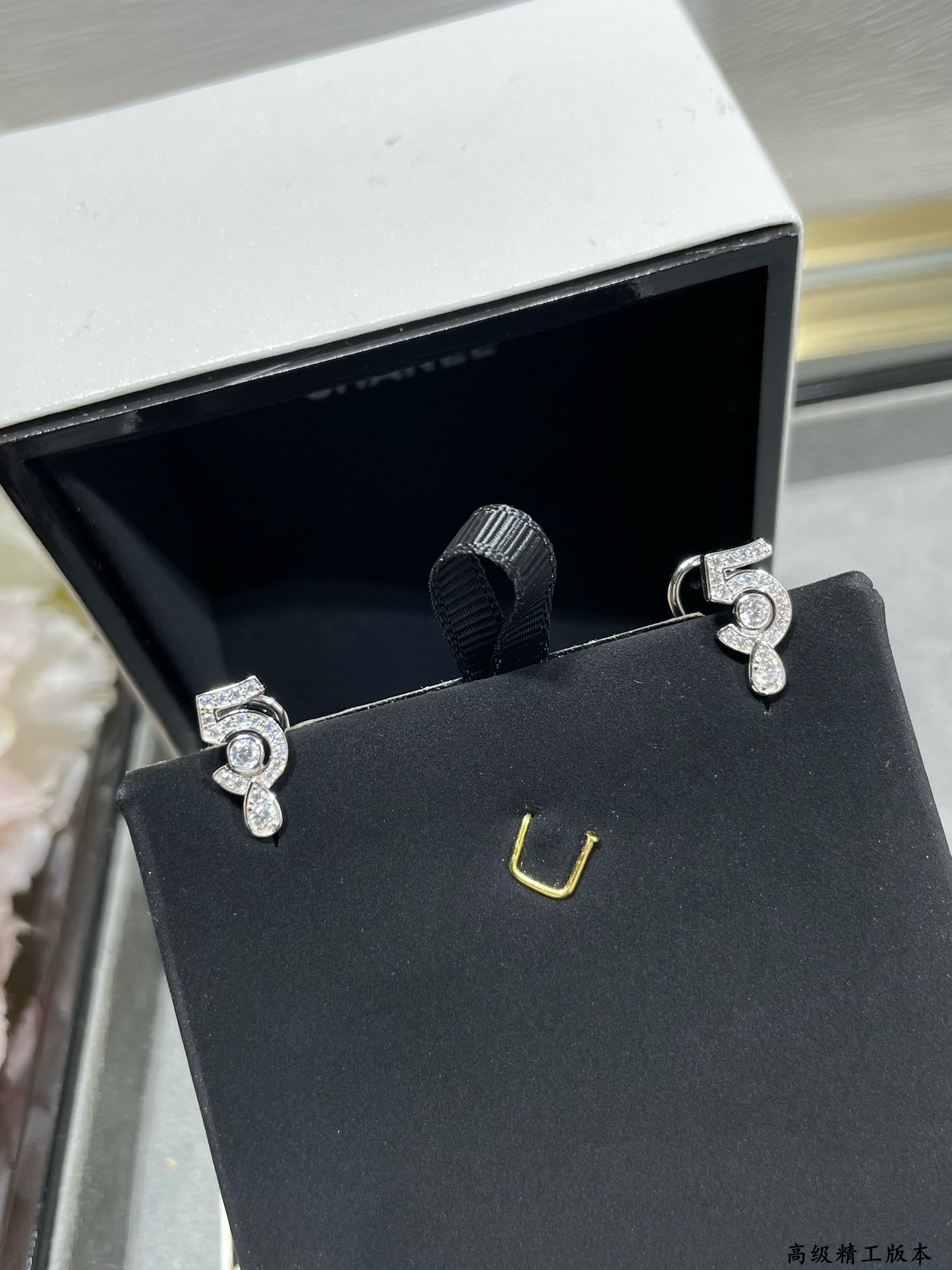 Ch*el 5-word earrings