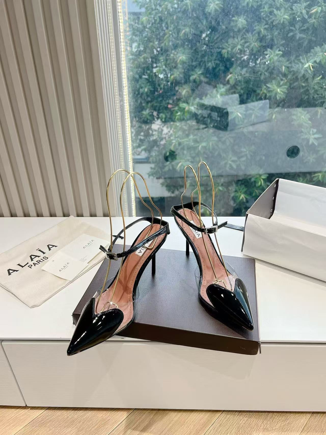 UA ALAÏA Patent Heart-Toe Stiletto Pumps