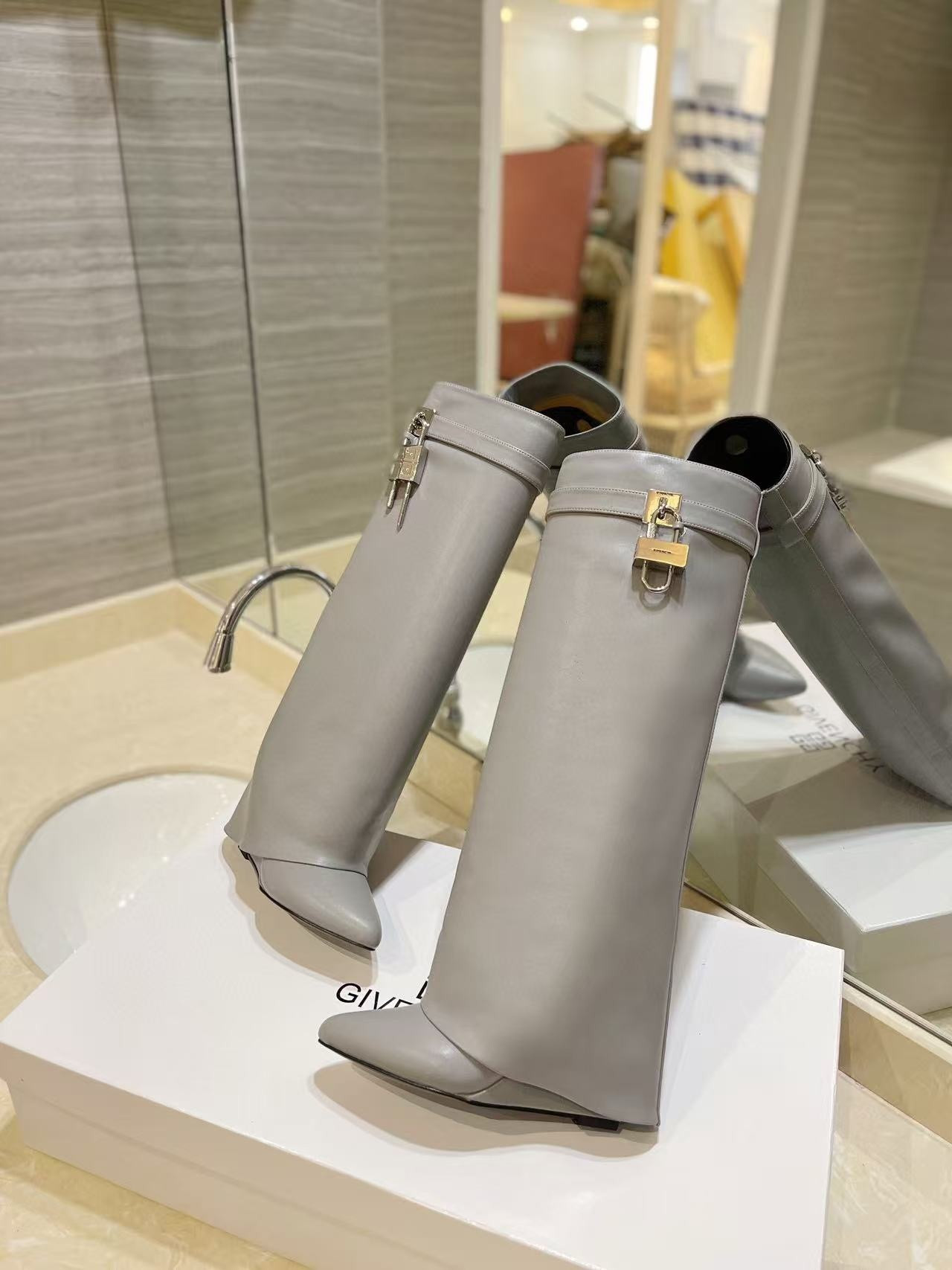 UA Givenchy Shark Lock boots in leather