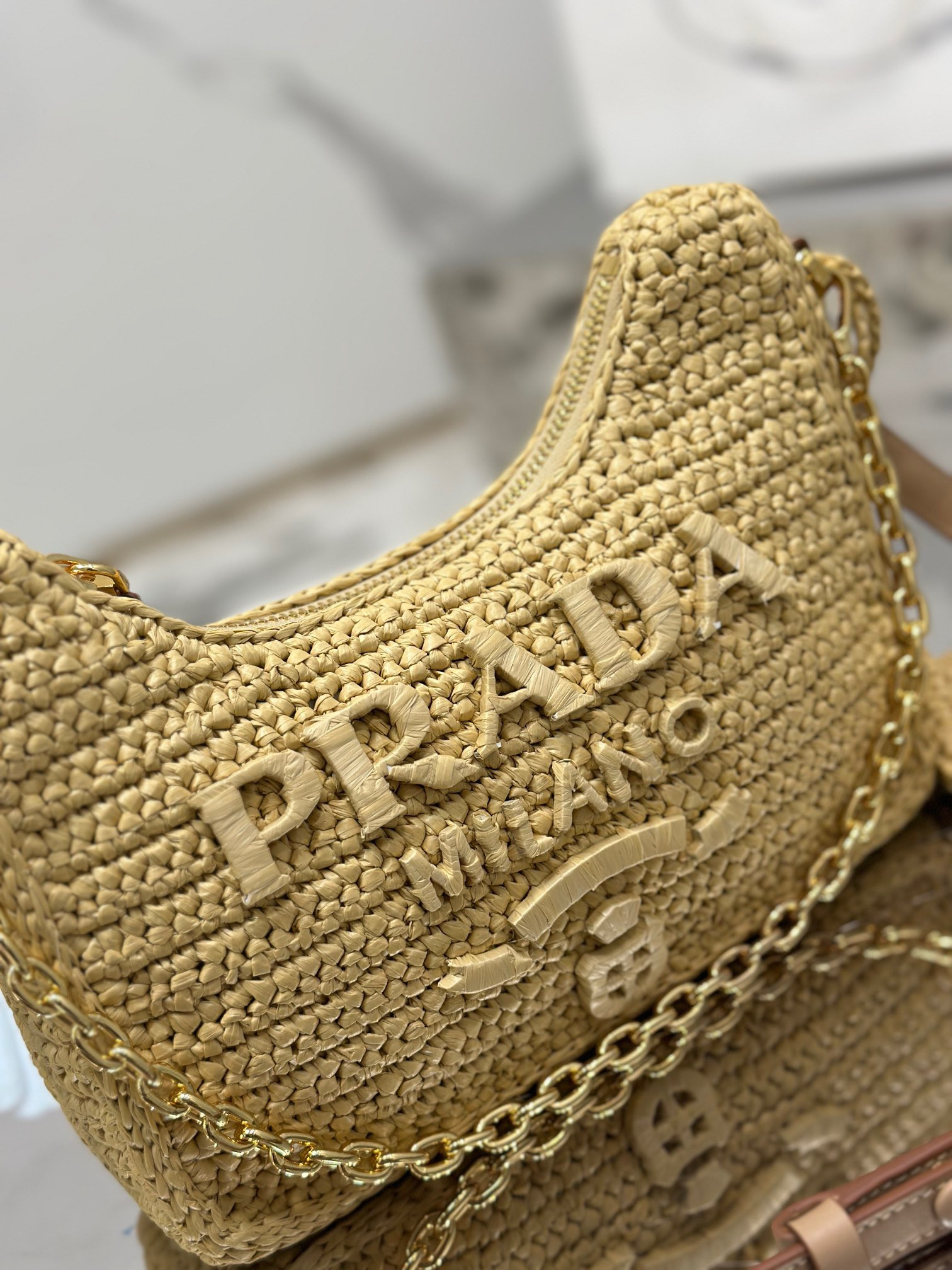 Pra*a re-edition crochet mini-bag color natural