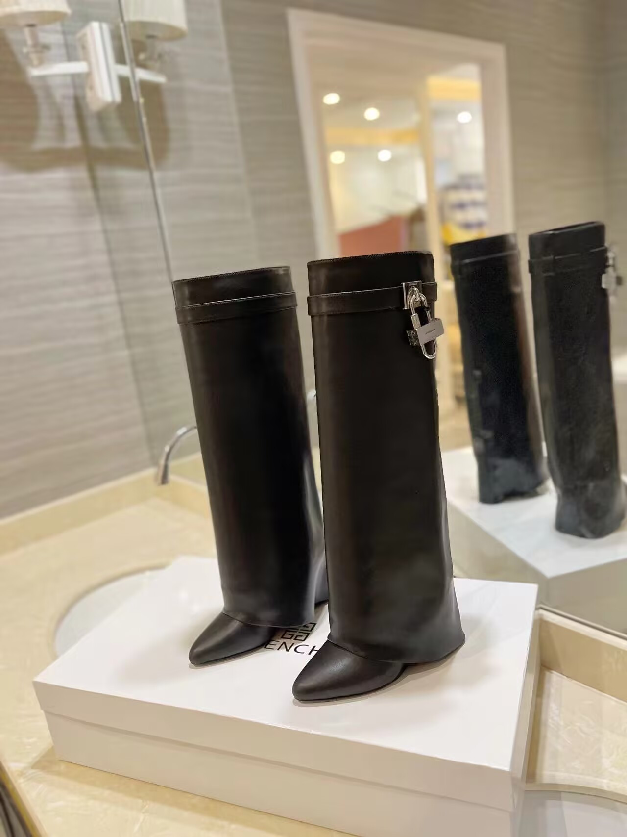 UA Givenchy Shark Lock boots in leather