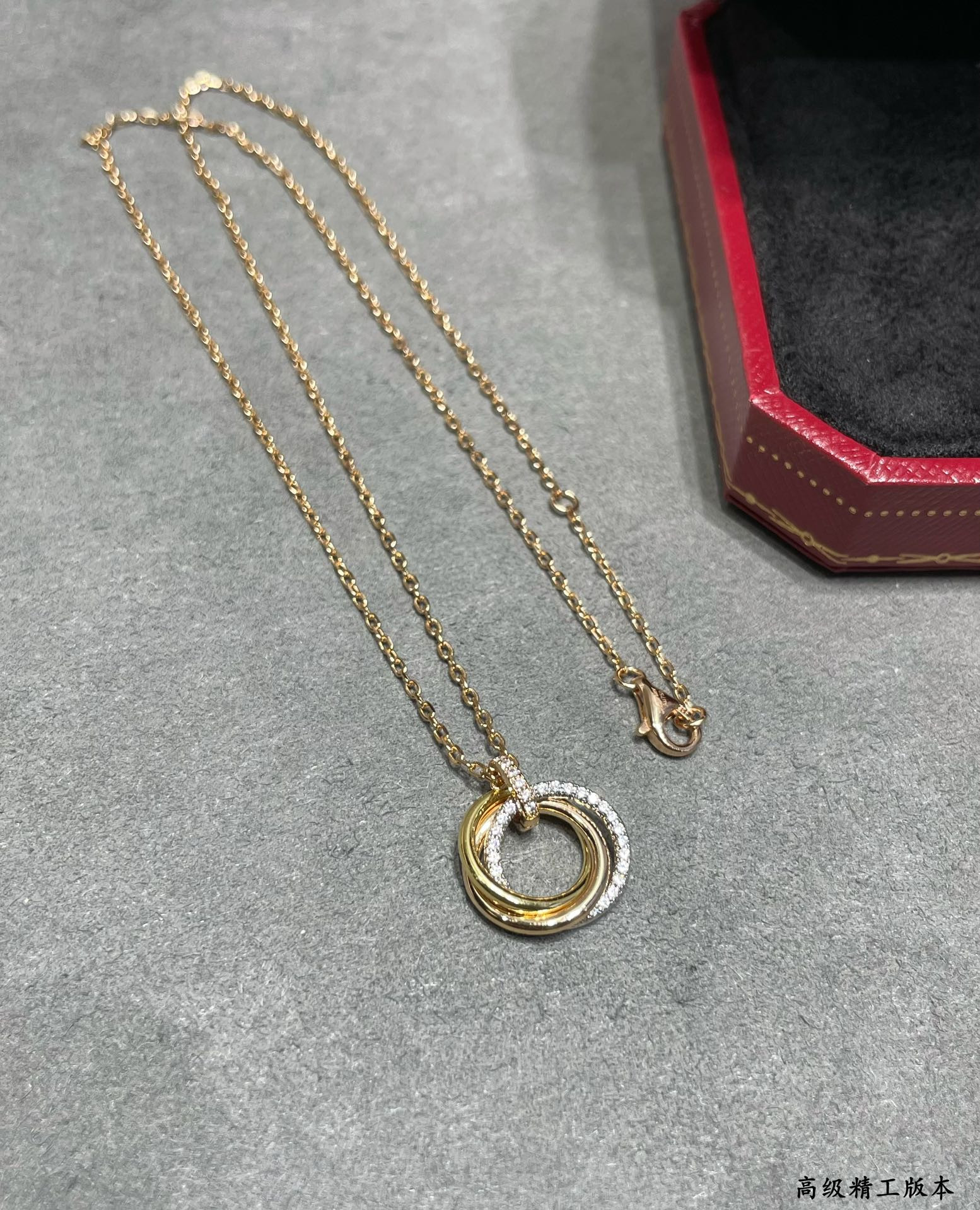 ca*t*er small size triple-ring Di*m*nd necklace