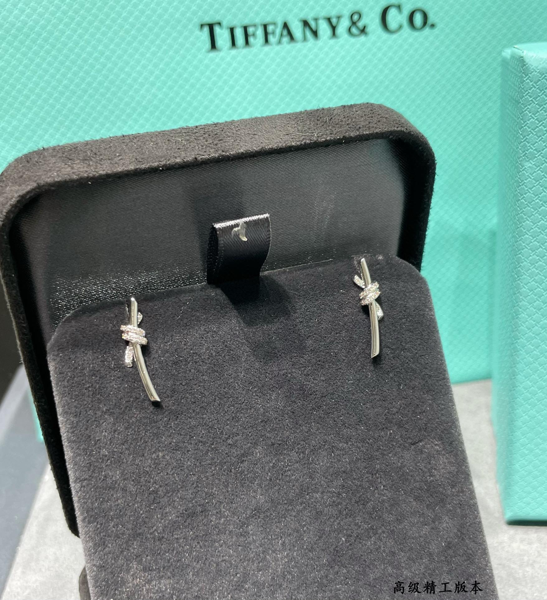 t*f*ny & co. half-Di*m*nd t wire knot stud earrings