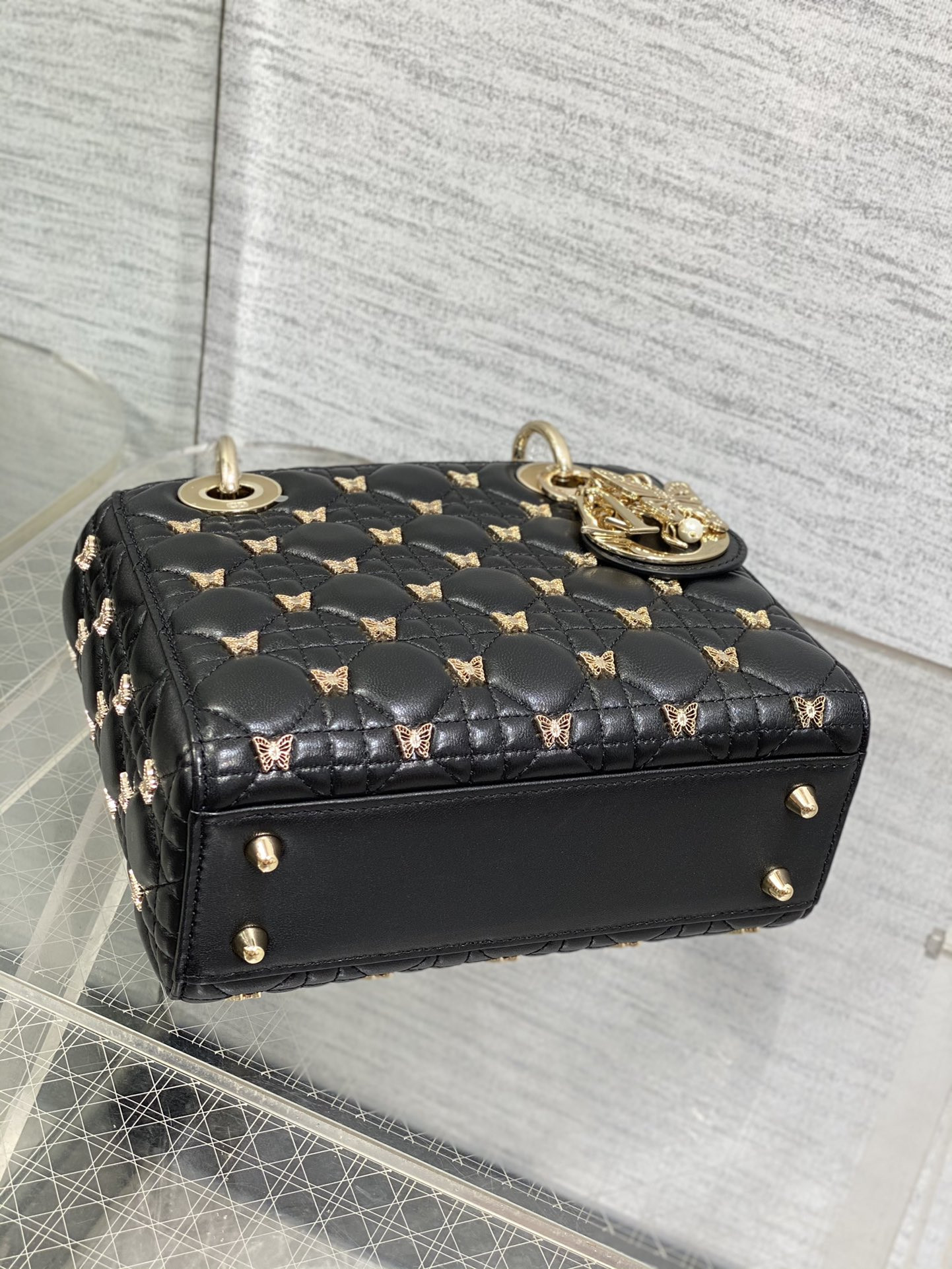small lady D*or black with butterfly studs