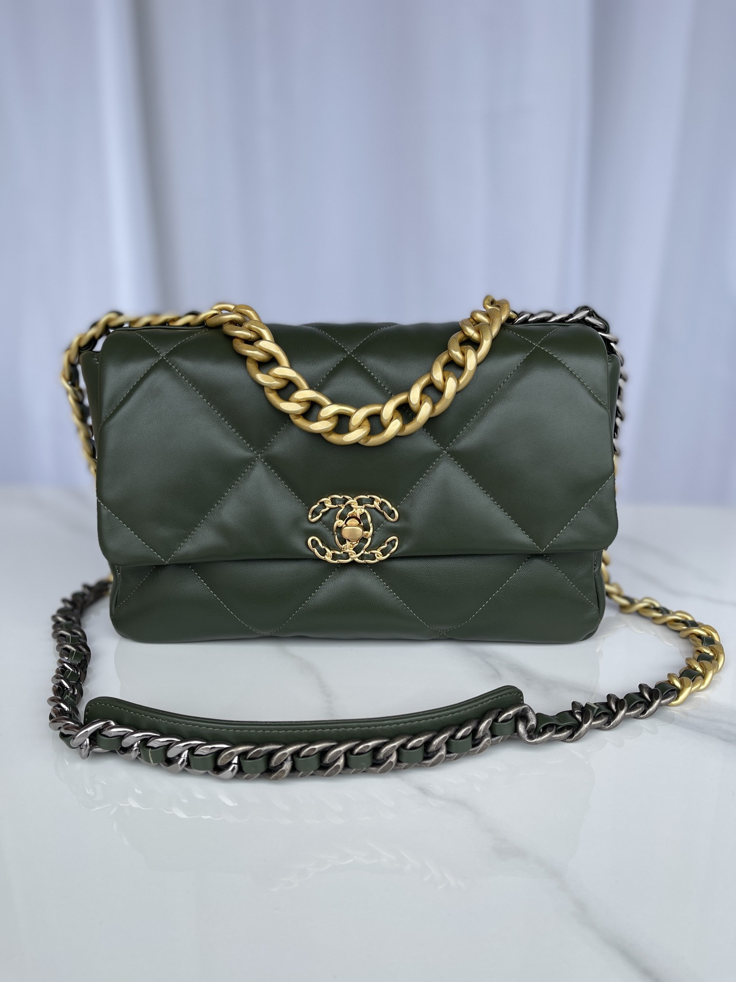 Ch*el 19 large handbag shiny leather, gold-tone, silver-tone & ruthenium-finish metal dark green 7.8 × 11.7 × 3.9 in