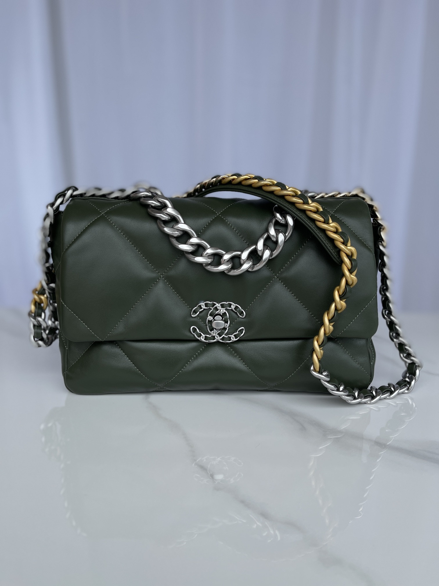 Ch*el 19 large handbag shiny leather, gold-tone, silver-tone & ruthenium-finish metal dark green 7.8 × 11.7 × 3.9 in