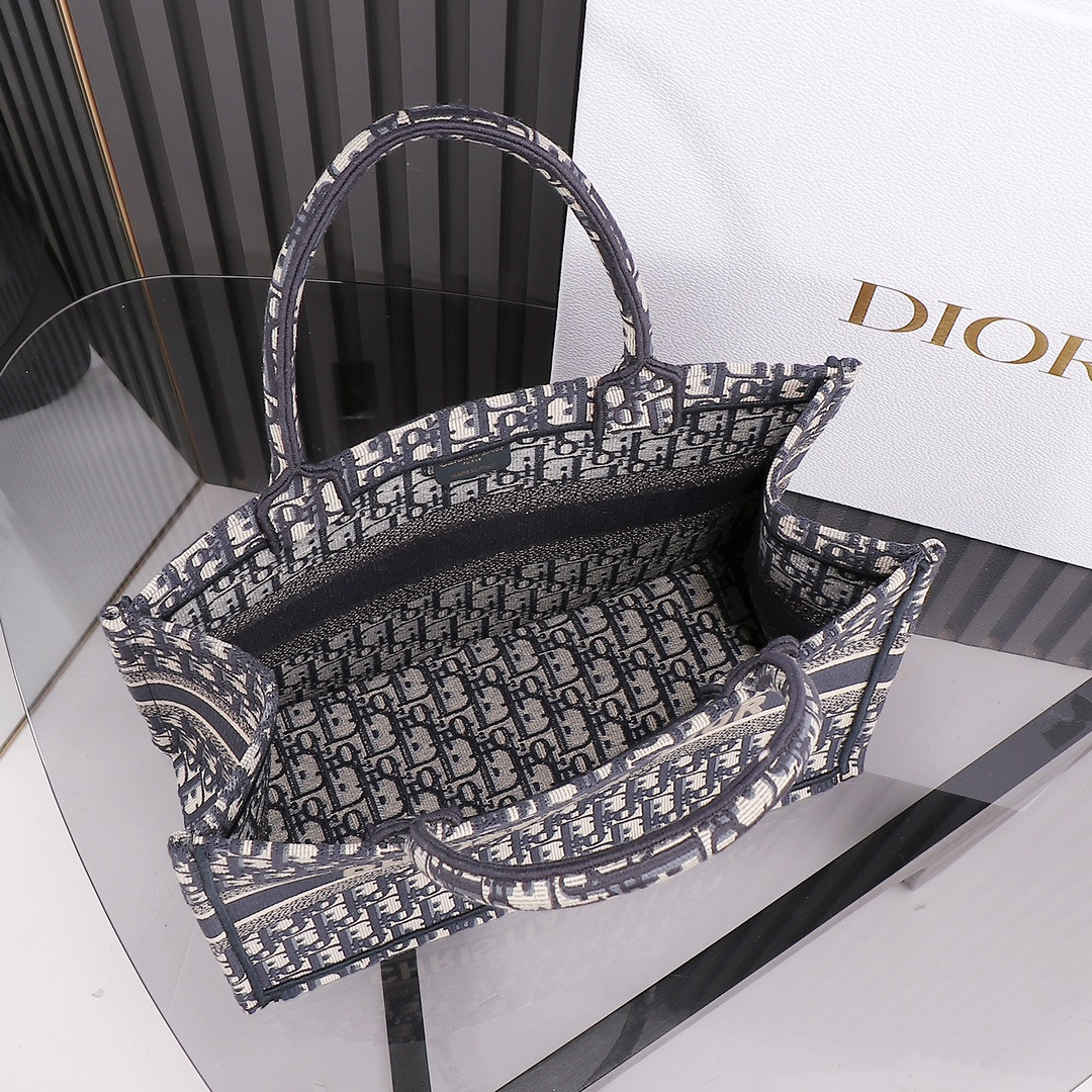 medium D*or book tote  ecru and blue D*or oblique embroidery 14 x 11 x 6.5 inches