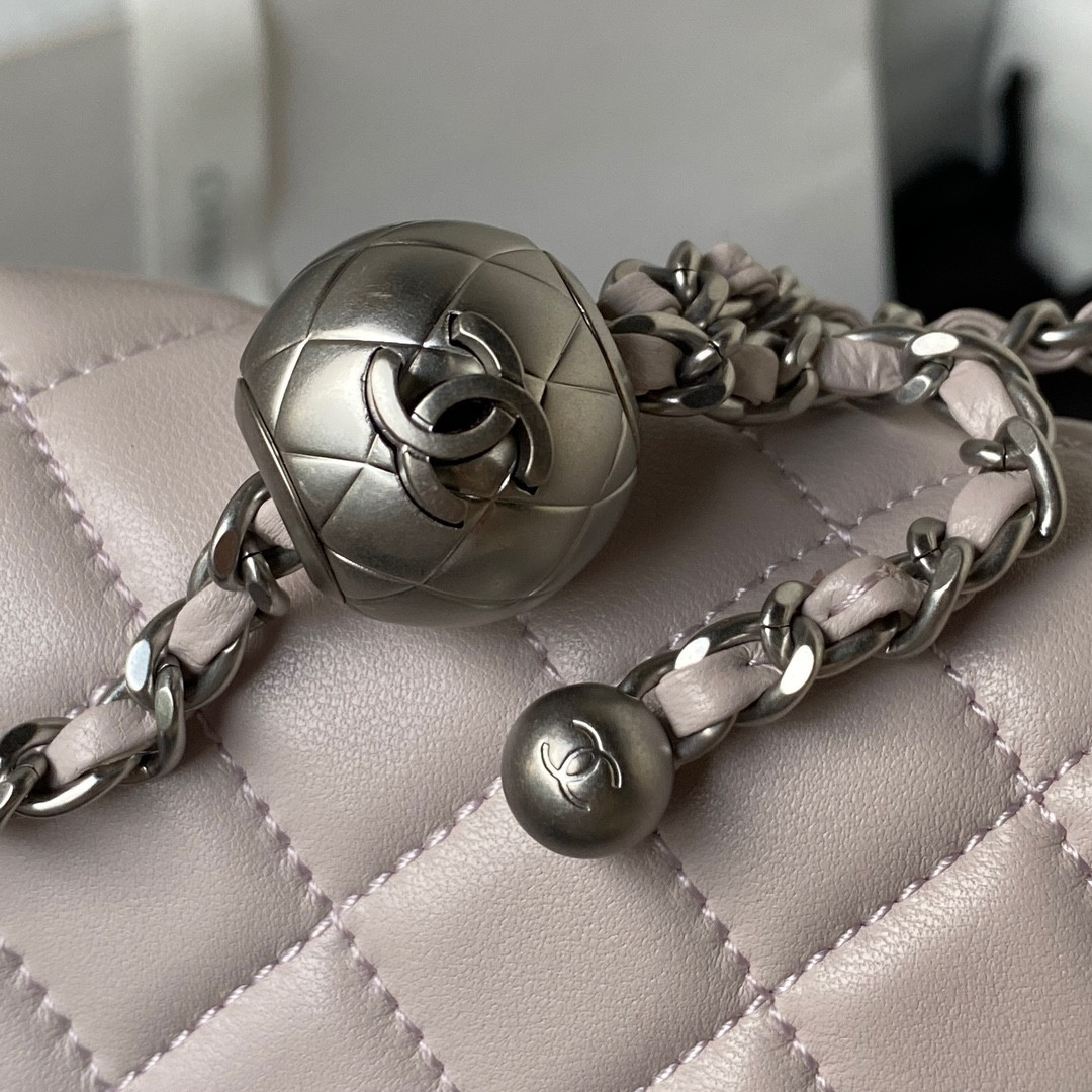 Ch*el mini flap bag shiny calfskin & silver-tone metal light pink 4.7 × 7.8 × 2.3 in