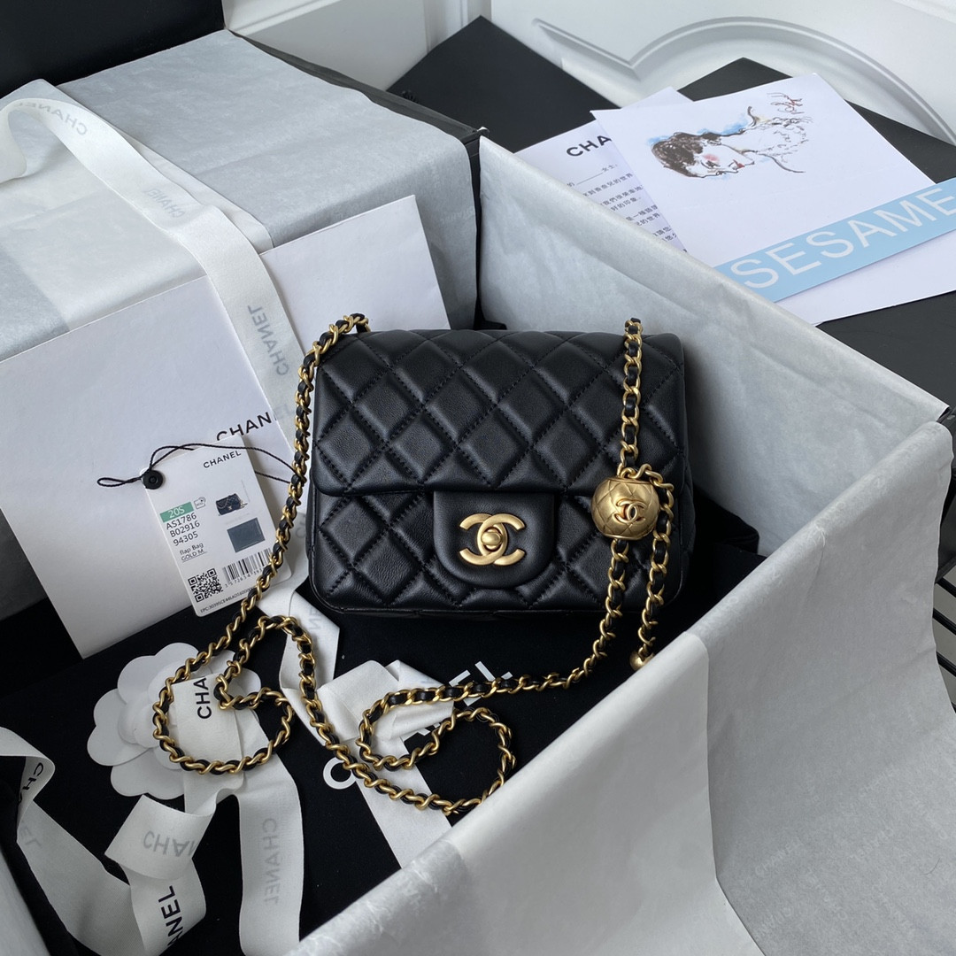 Ch*el mini flap bag shiny calfskin & gold-tone metal black 5.3 × 6.6 × 3.1 in