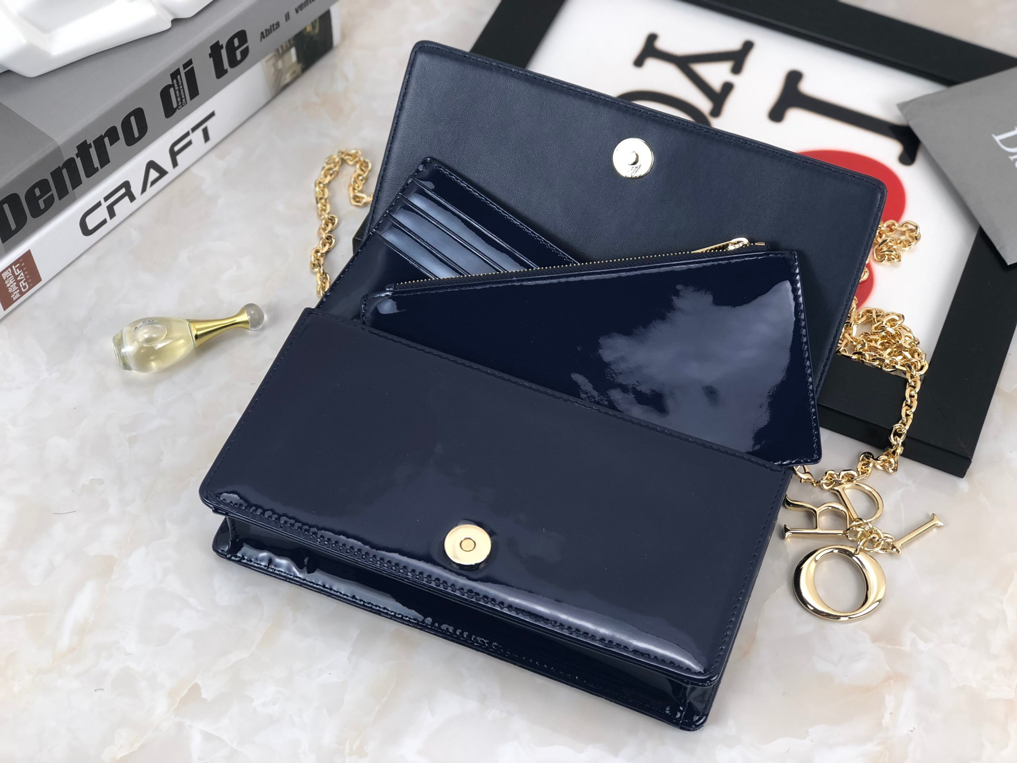 lady D*or pouch navy patent cannage calfskin 8.5 x 4.5 x 1 inches