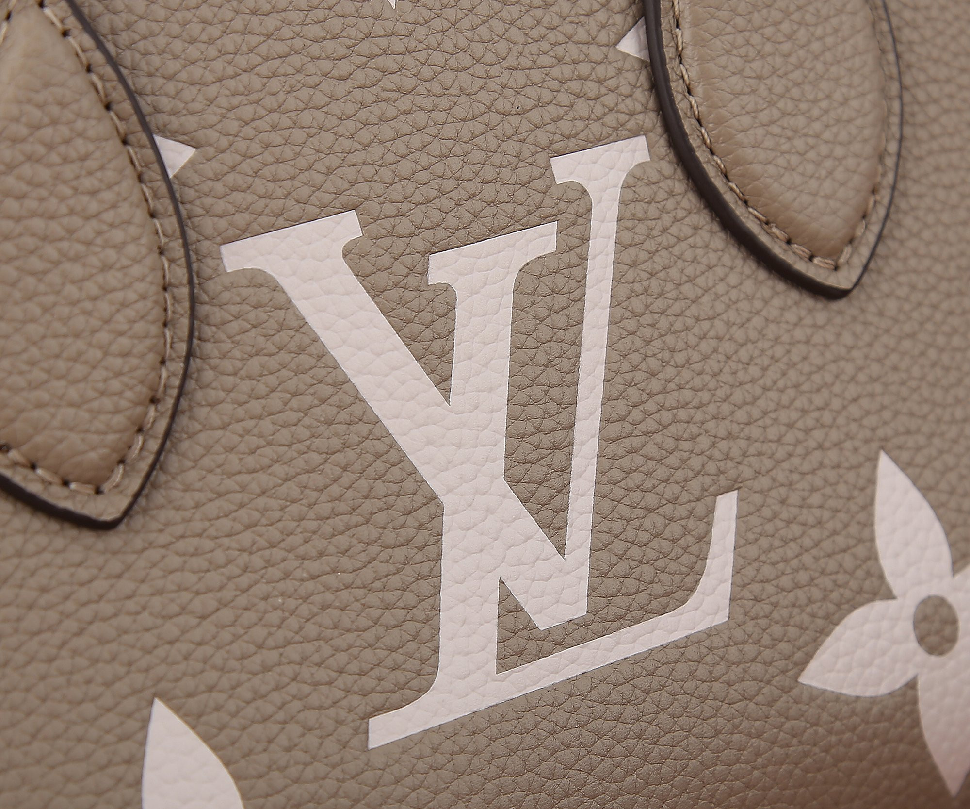 LV OnTheGo East West M23641 9.8 x 5.1 x 3.9 inches