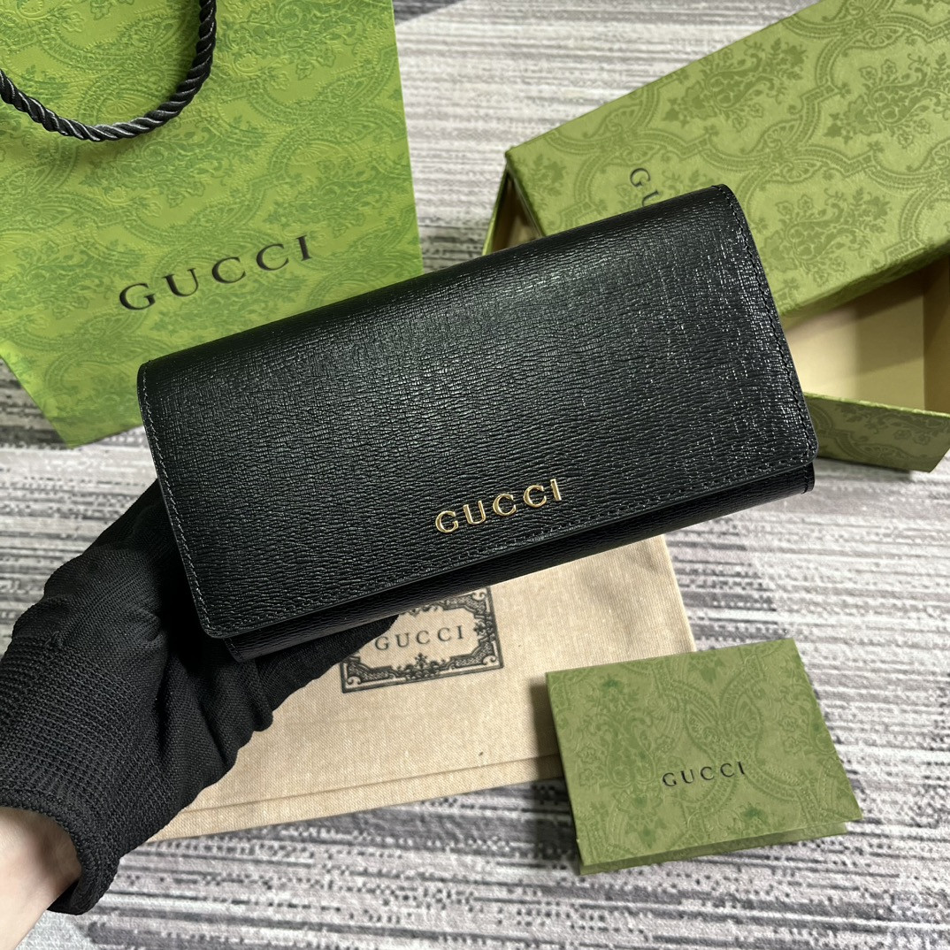 continental wallet with G*u*i script 7.5"w x 4"h x 1.4"d