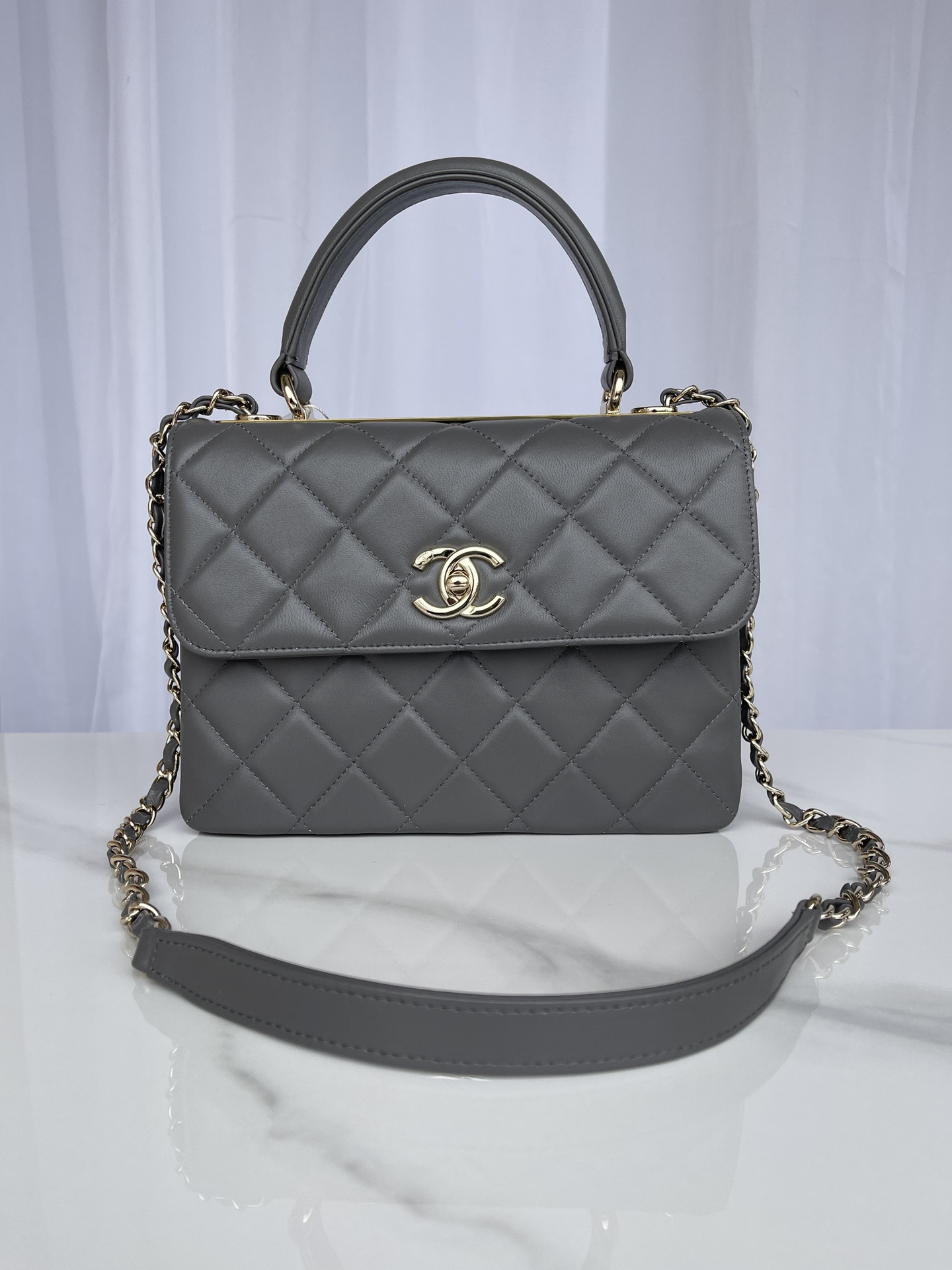 Ch*el flap bag with top handle 6.6 × 9.8 × 4.7 in