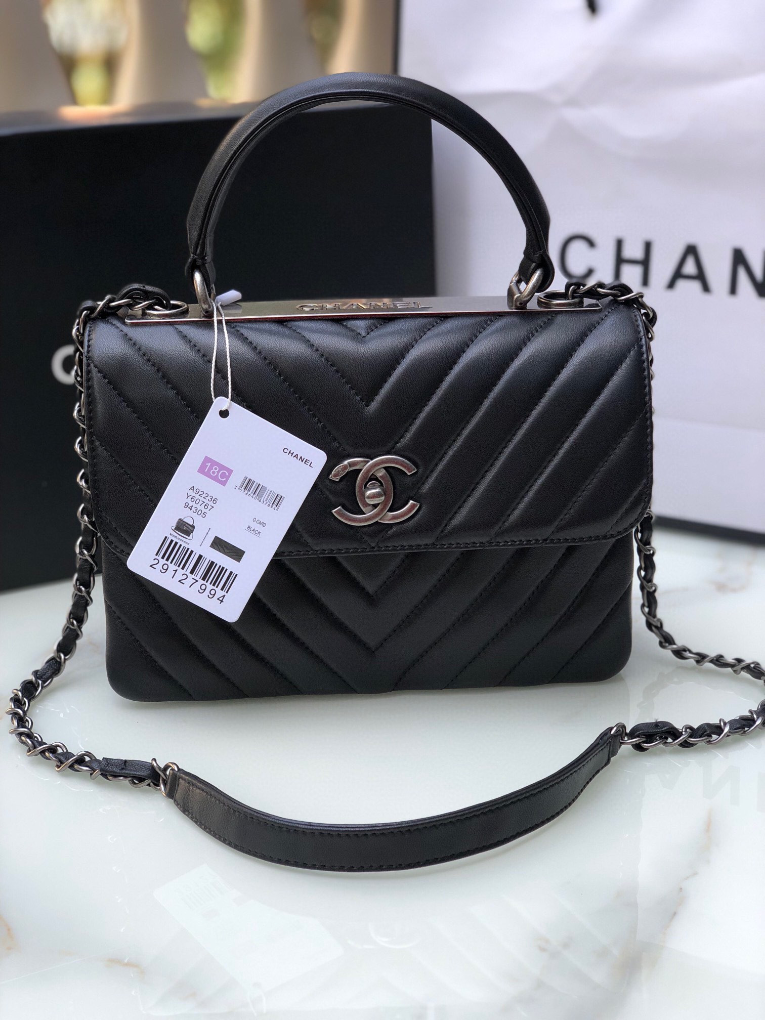 Ch*el flap bag with top handle 6.6 × 9.8 × 4.7 in
