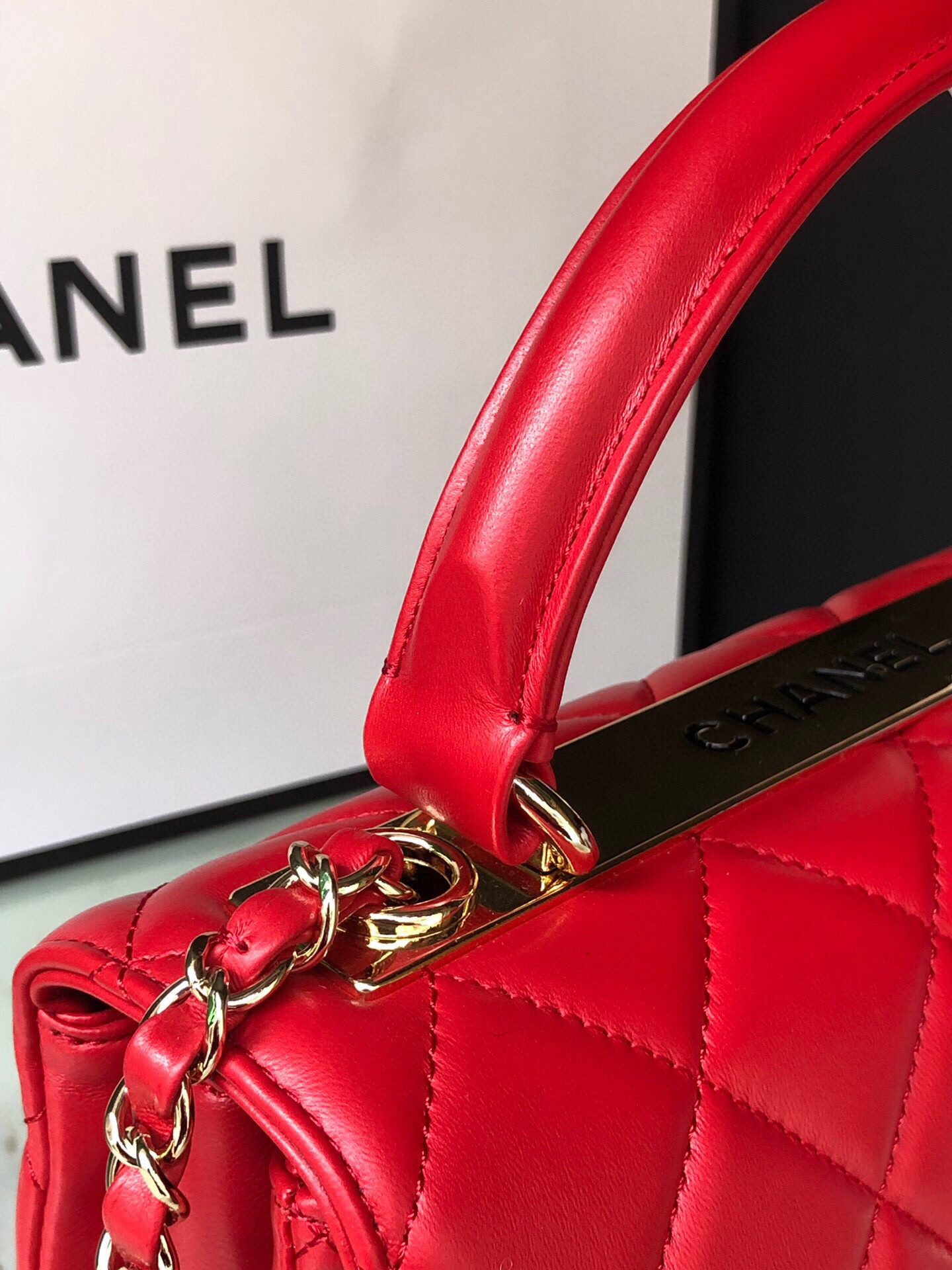 Ch*el flap bag with top handle 6.6 × 9.8 × 4.7 in
