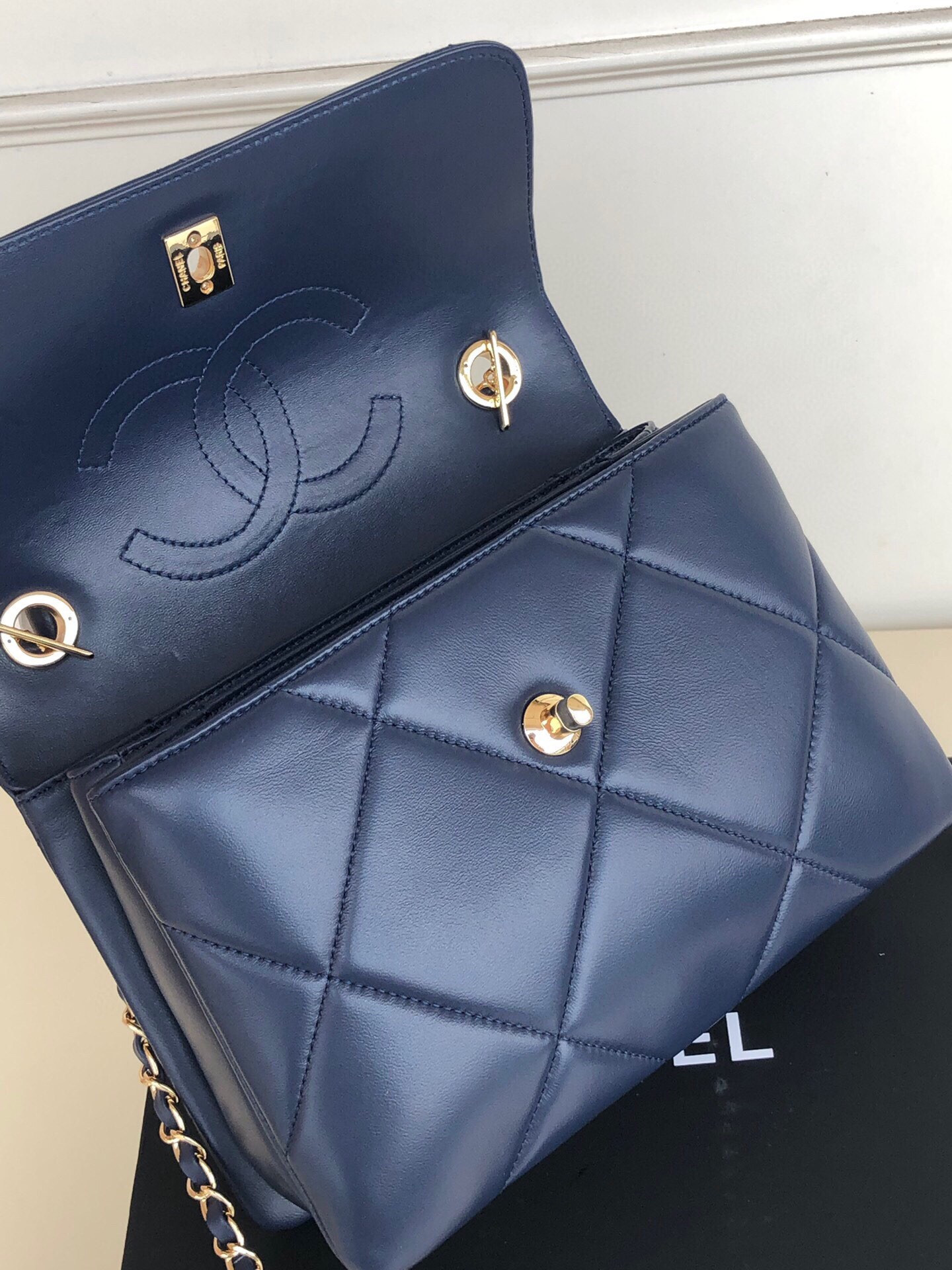 Ch*el flap bag with top handle 6.6 × 9.8 × 4.7 in