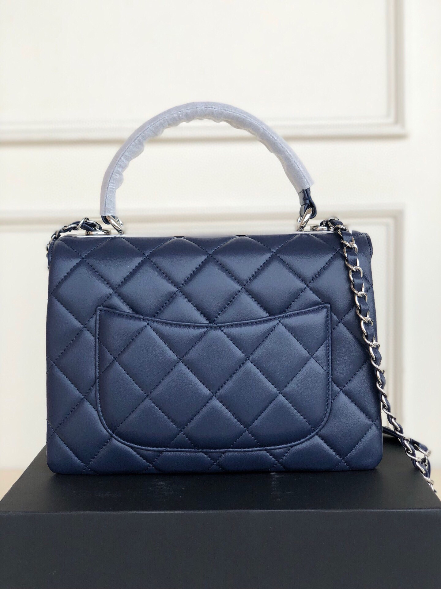 Ch*el flap bag with top handle 6.6 × 9.8 × 4.7 in
