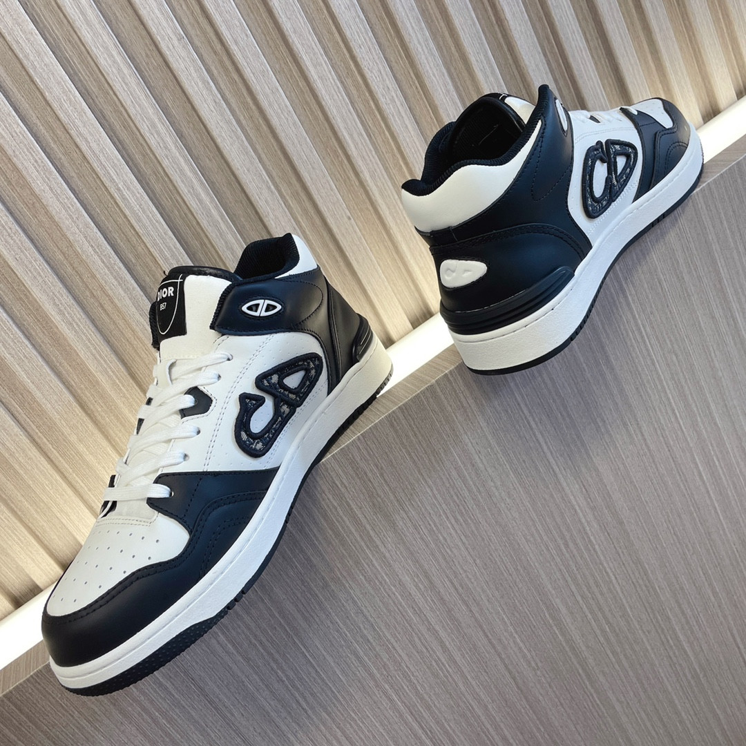 ua D*or b57 mid-top sneaker black and white