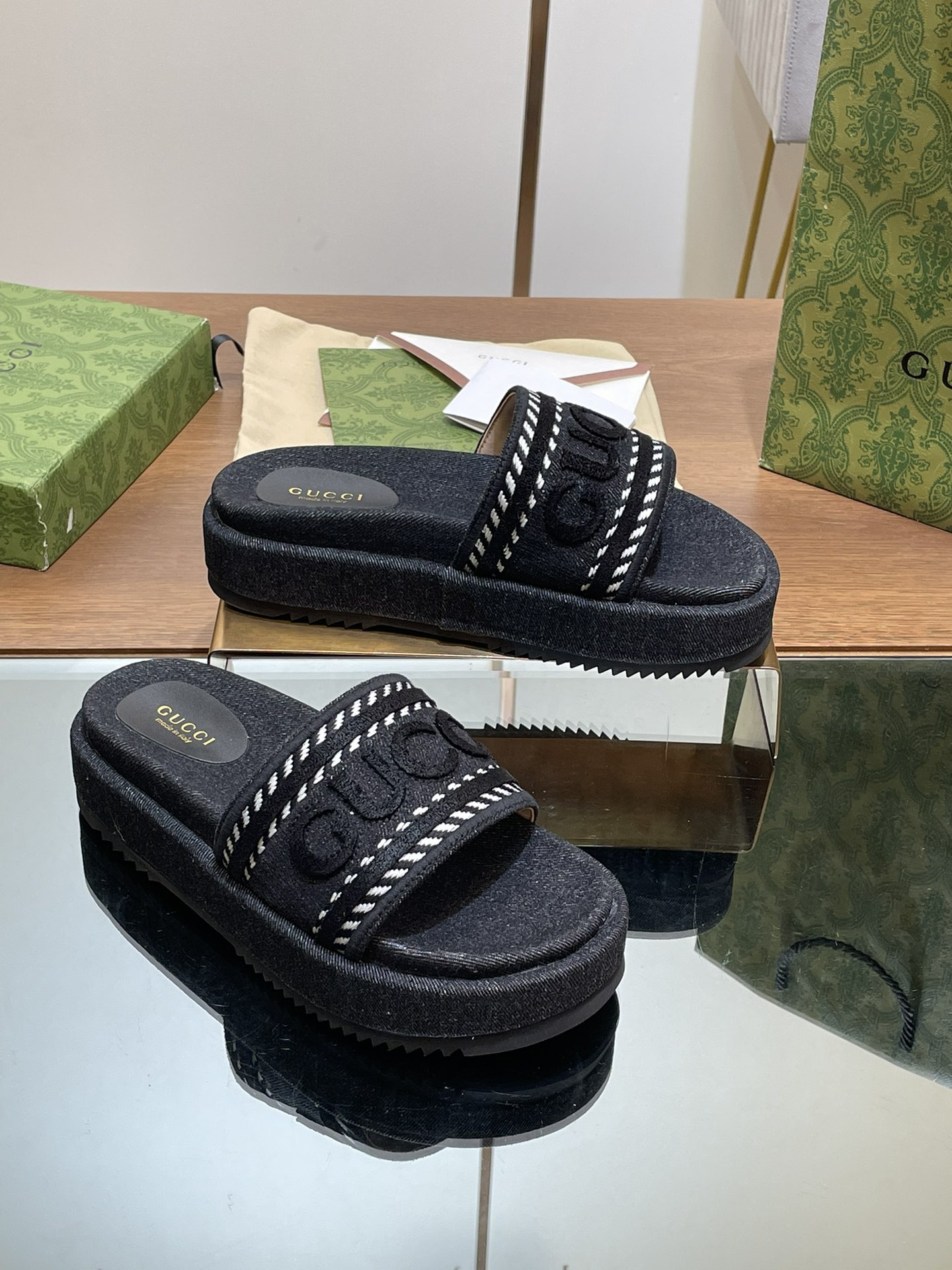 ua G*u*i slide sandal with G*u*i script