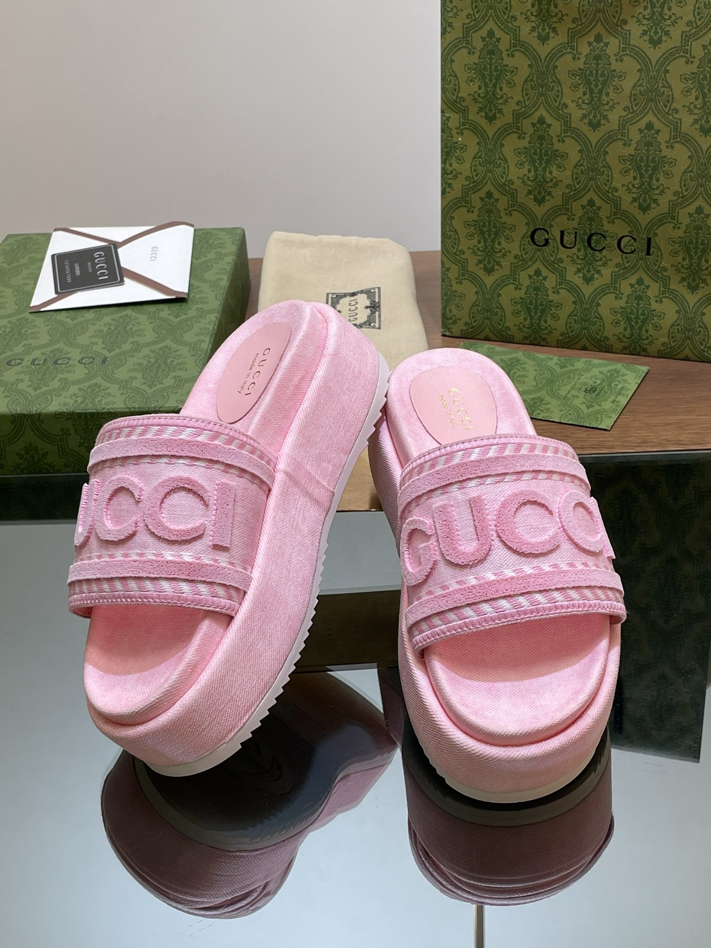 ua G*u*i slide sandal with G*u*i script