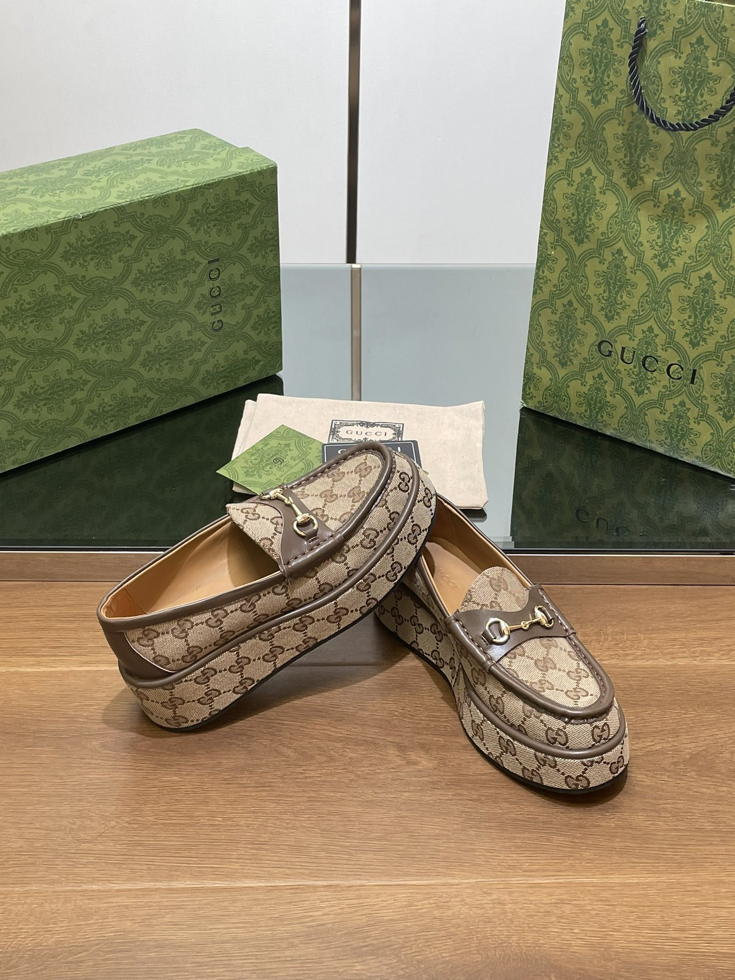 ua G*u*i horsebit wedge loafer