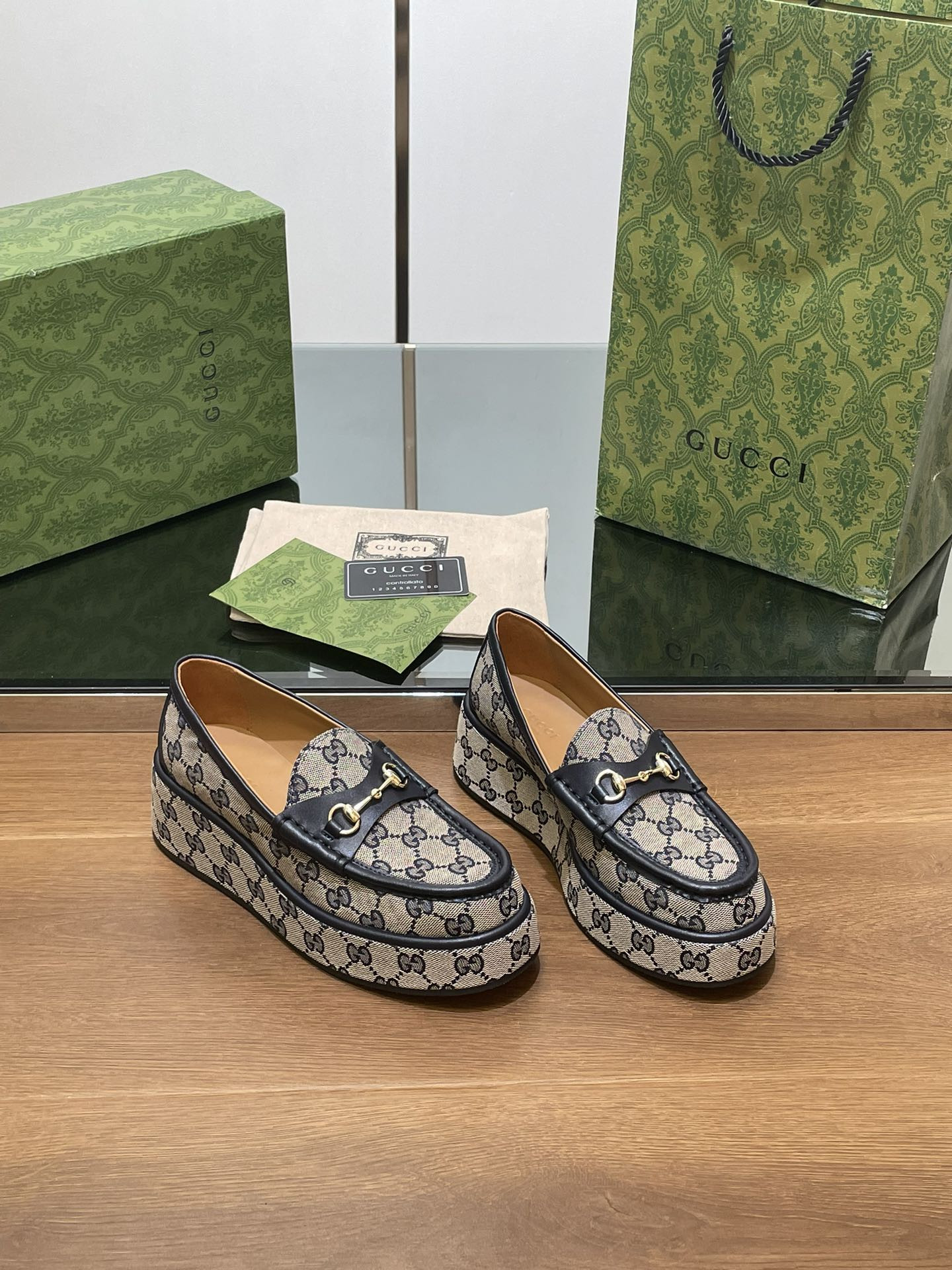 ua G*u*i horsebit wedge loafer