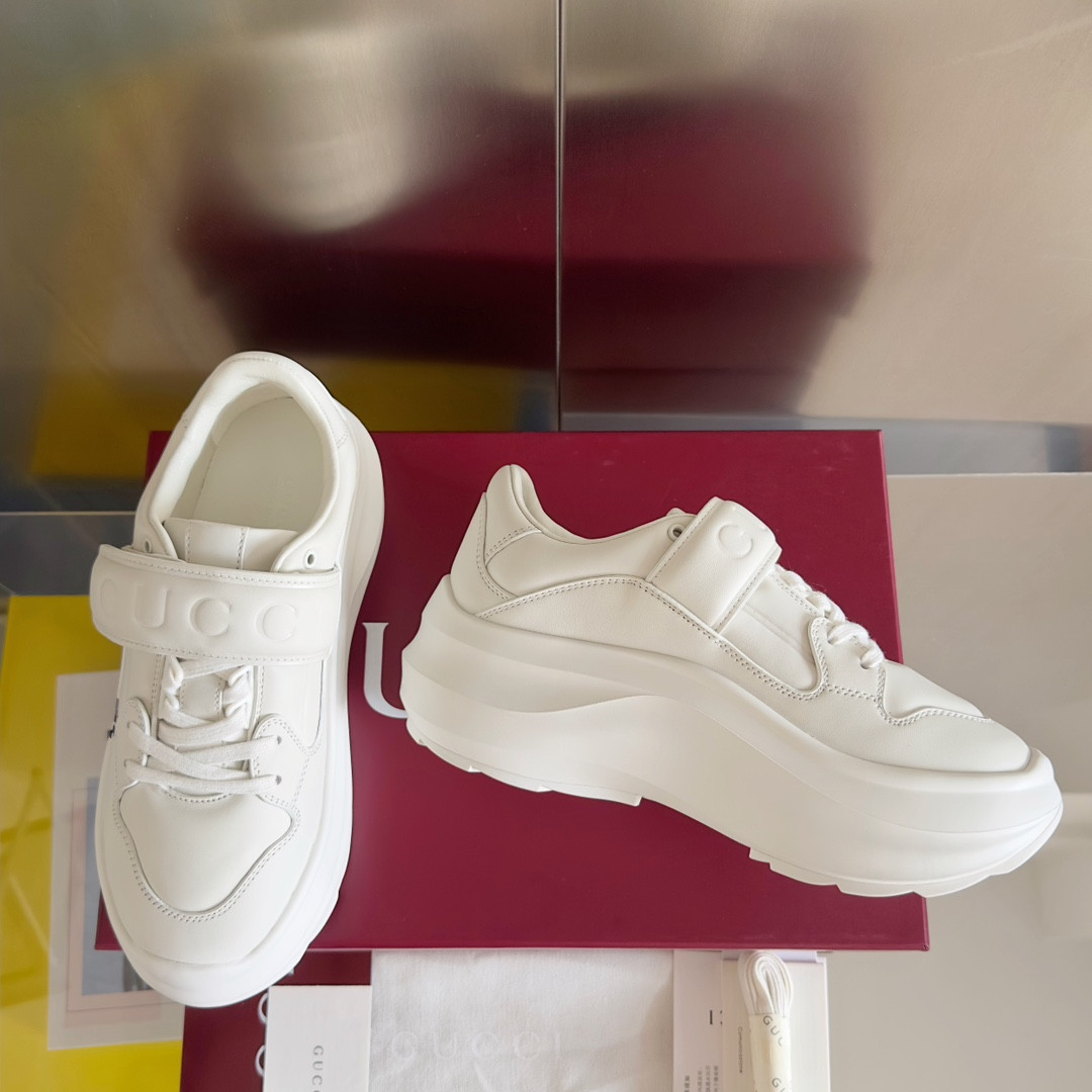 ua G*u*i wave wedge sneaker