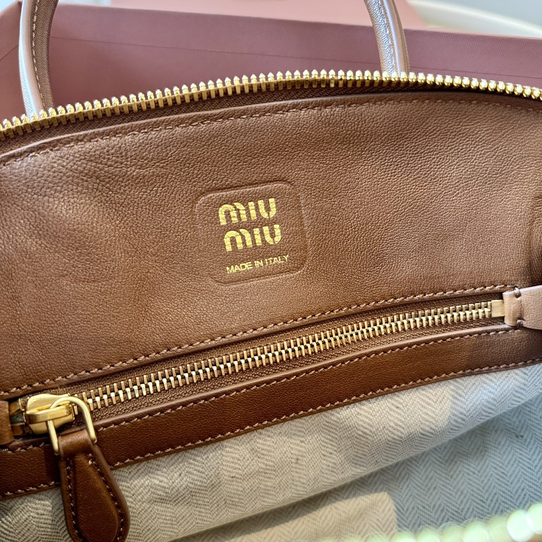 Miu Miu Aventure nappa leather top-handle bag 16.5x28x10cm
