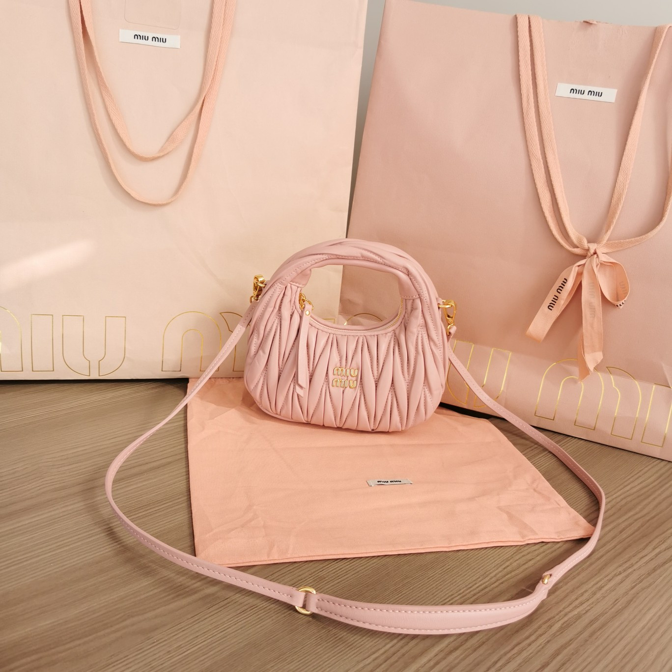Miu Miu Wander matelassé nappa leather hobo mini-bag 14x17.5x5.5cm