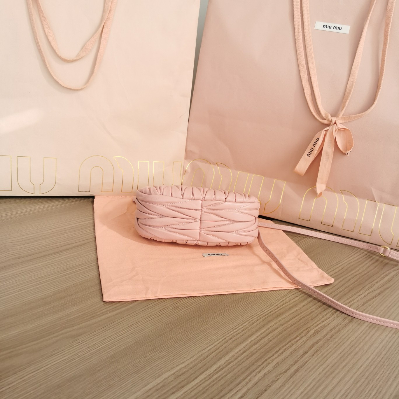 Miu Miu Wander matelassé nappa leather hobo mini-bag 14x17.5x5.5cm