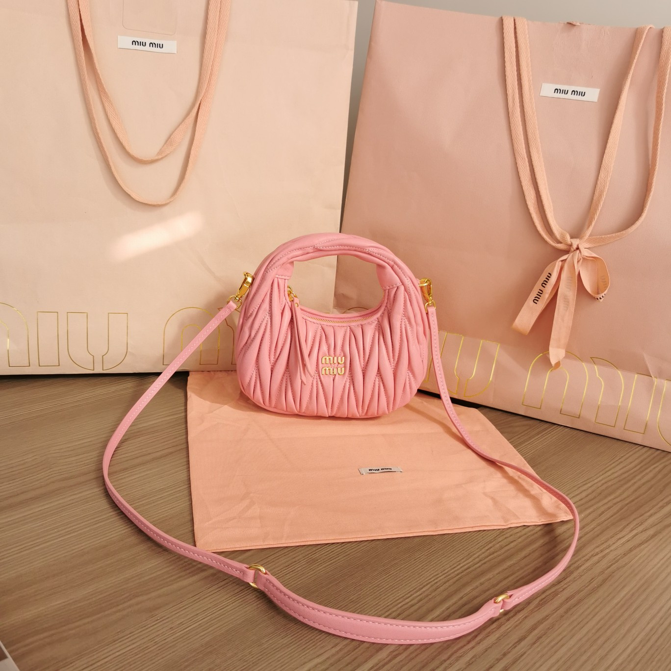 Miu Miu Wander matelassé nappa leather hobo mini-bag 14x17.5x5.5cm