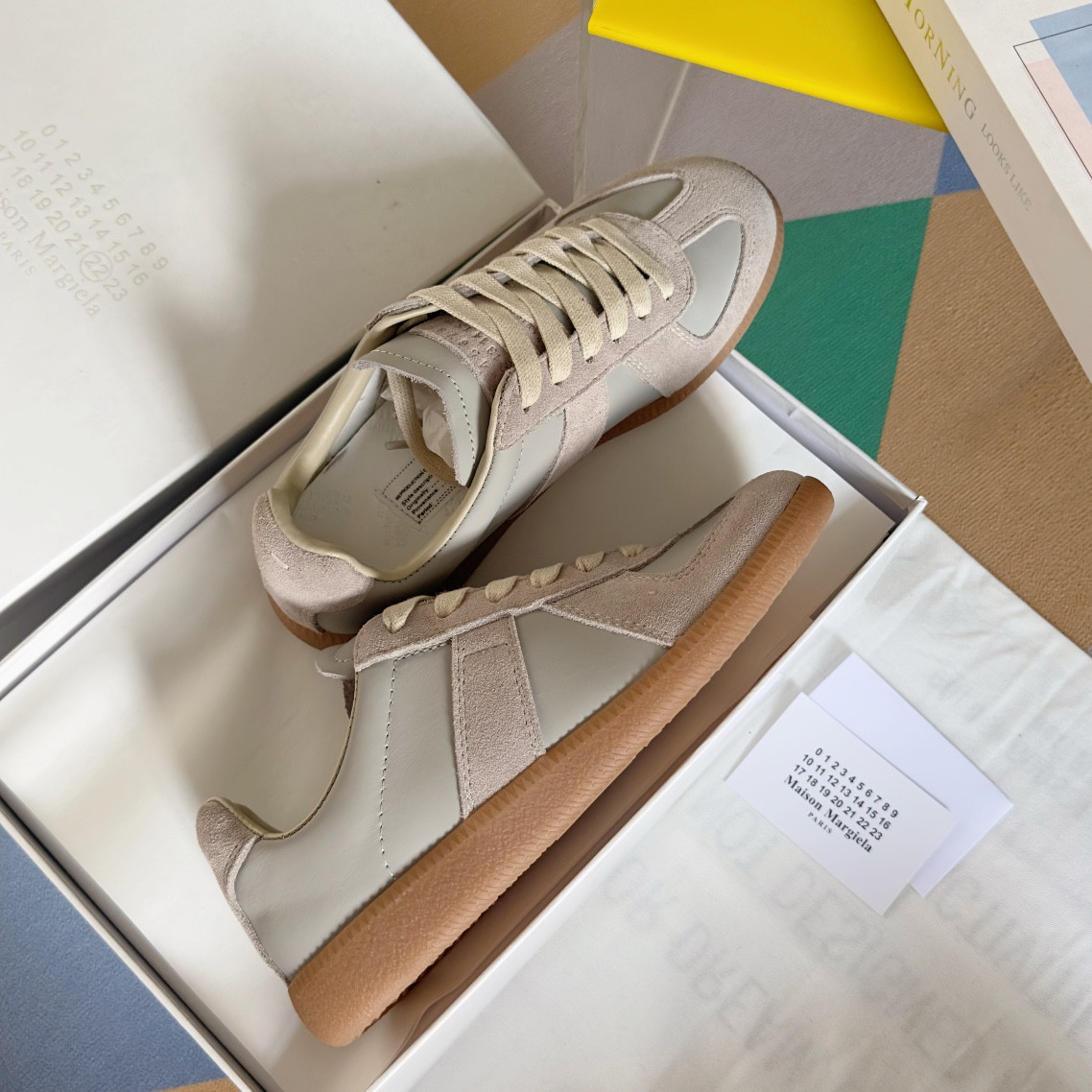 ua ma*s*n Ma*i*la mm6 sneakers