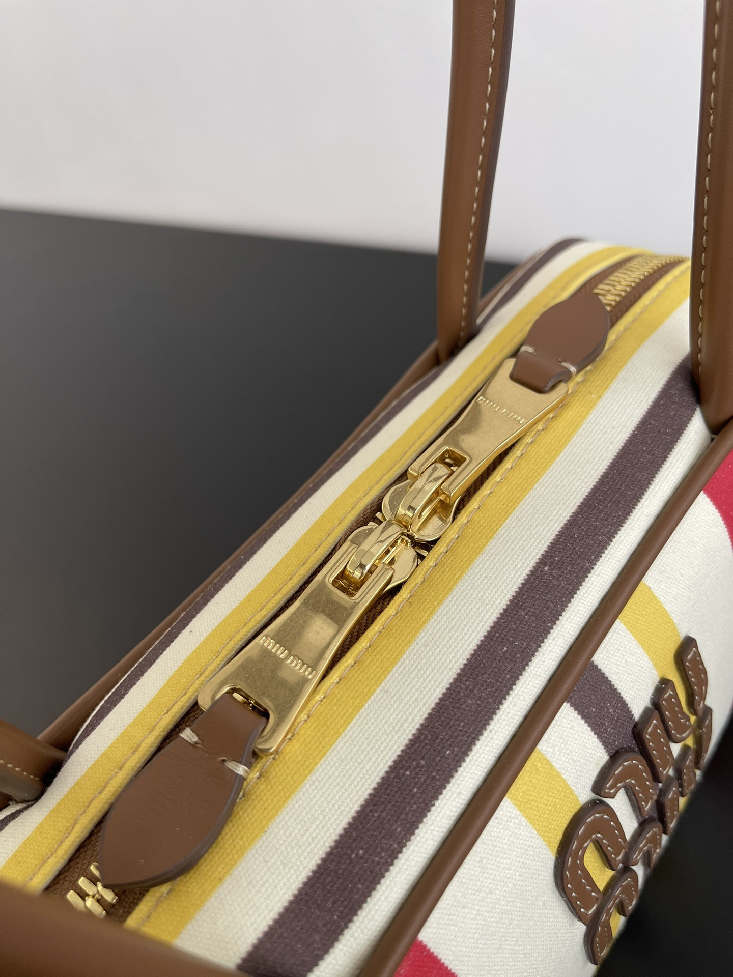 Miu Miu Beau canvas and leather bag 11.5x28x8cm