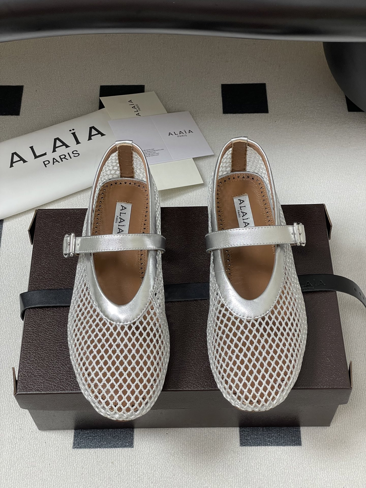 UA ALAÏA BALLET FLATS IN FISHNET